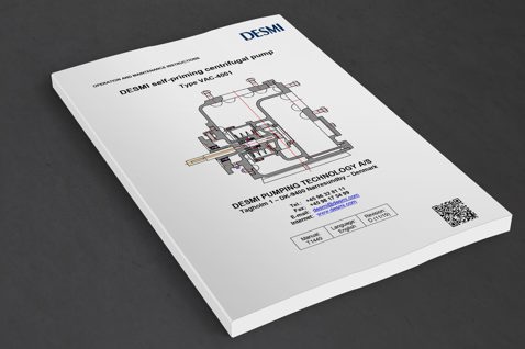 DESMI manual for self-priming centrifugal pump, Type VAC-4001, on a table.